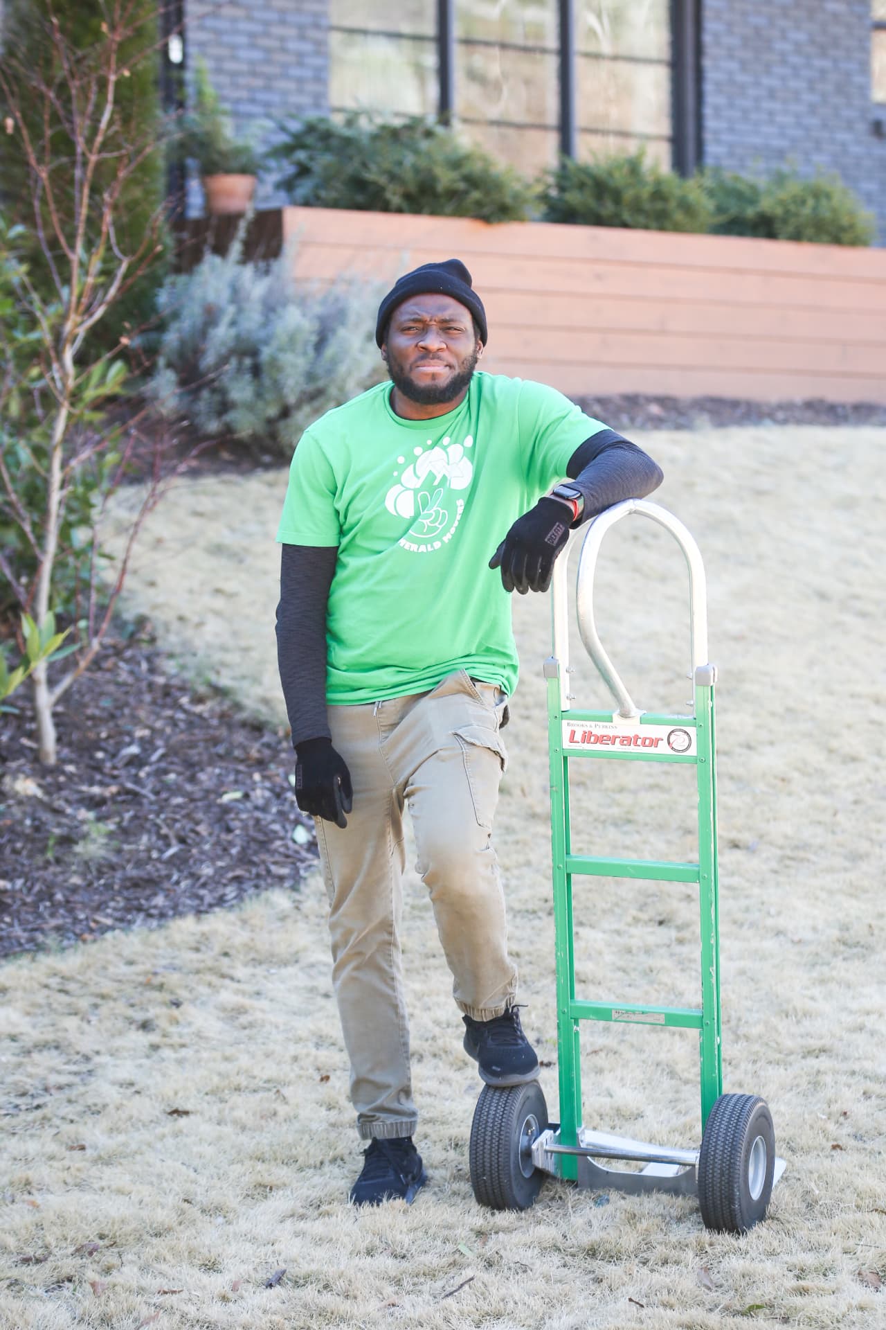 Emerald Movers team member with a hand truck ready for a residential move